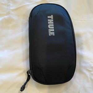 Thule subterra power shuttle mini electronics case.  Never used. Like new.
